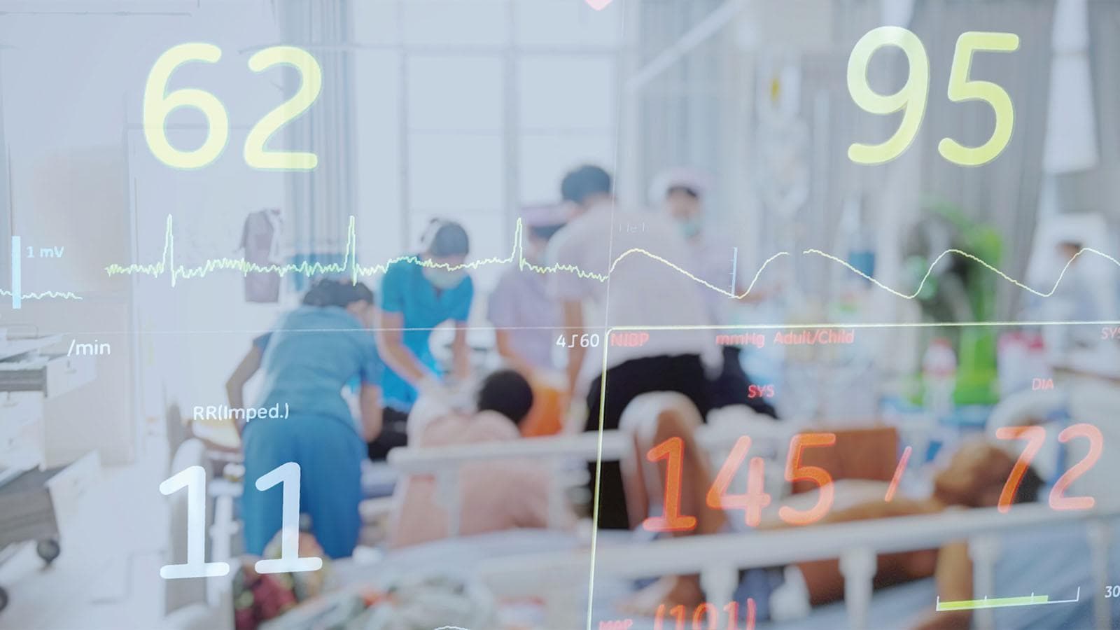 Emergency room team working with various numbers and graphs in the foreground